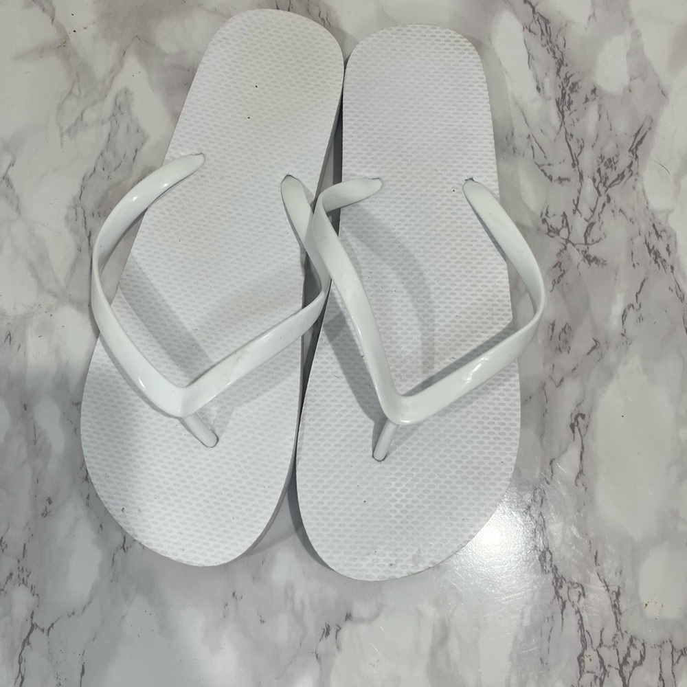 Women’s white flip flops size 8